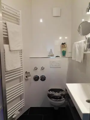 Ein Badezimmer in der Unterkunft Ferienwohnung Delphin