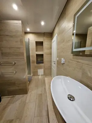 Ein Badezimmer in der Unterkunft Klein Haus 12A