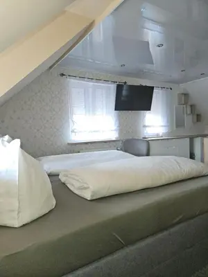 Ein Bett oder Betten in einem Zimmer der Unterkunft Klein Haus 12A