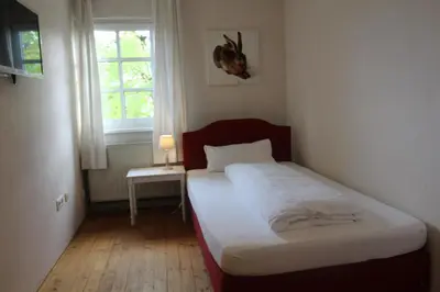 Ein Bett oder Betten in einem Zimmer der Unterkunft Hotel-Gasthof Opel Bed & Breakfast