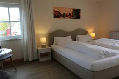 Ein Bett oder Betten in einem Zimmer der Unterkunft Hotel-Gasthof Opel Bed & Breakfast