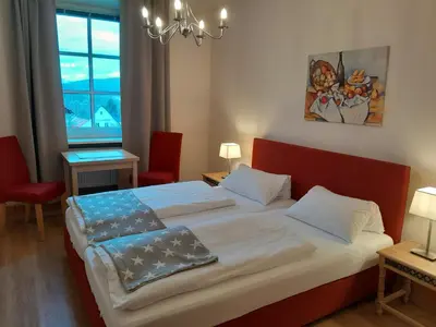 Ein Bett oder Betten in einem Zimmer der Unterkunft Hotel-Gasthof Opel Bed & Breakfast