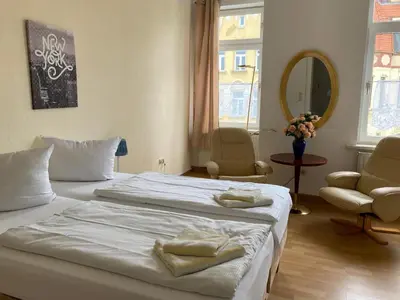 Ein Bett oder Betten in einem Zimmer der Unterkunft Mabri Apartments Plauen