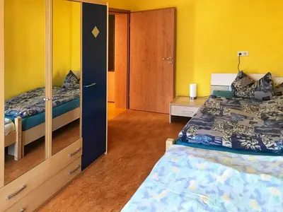 Ein Bett oder Betten in einem Zimmer der Unterkunft Ferienwohnung Burgblick