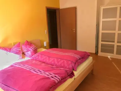Ein Bett oder Betten in einem Zimmer der Unterkunft Ferienwohnung Burgblick