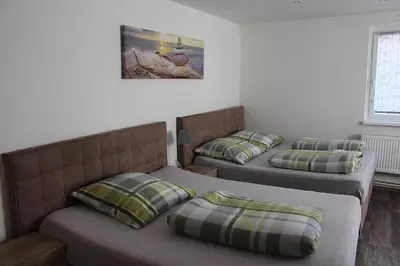 Ein Bett oder Betten in einem Zimmer der Unterkunft Pension Mois