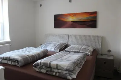 Ein Bett oder Betten in einem Zimmer der Unterkunft Pension Mois