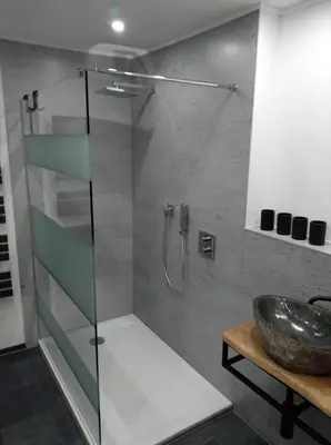 Ein Badezimmer in der Unterkunft Blockbohlenhaus