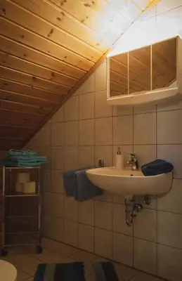 Ein Badezimmer in der Unterkunft Gaststätte und Pension Zum Torfstich