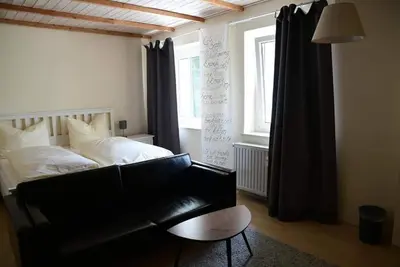 Ein Bett oder Betten in einem Zimmer der Unterkunft Hotel Berggasthof Waldlust