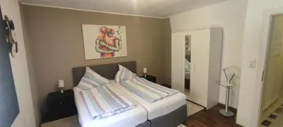 Ein Bett oder Betten in einem Zimmer der Unterkunft Ferienwohnung Jobst - Ruhig mit Blick ins Grüne