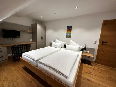 Ein Bett oder Betten in einem Zimmer der Unterkunft Gasthof Goldene Krone