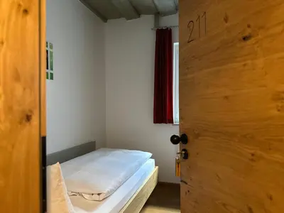 Ein Bett oder Betten in einem Zimmer der Unterkunft Gasthof Goldene Krone