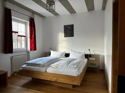 Ein Bett oder Betten in einem Zimmer der Unterkunft Gasthof Goldene Krone