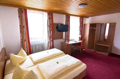 Ein Bett oder Betten in einem Zimmer der Unterkunft Ratsstube Pegnitz