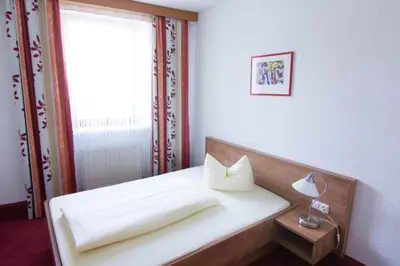 Ein Bett oder Betten in einem Zimmer der Unterkunft Ratsstube Pegnitz