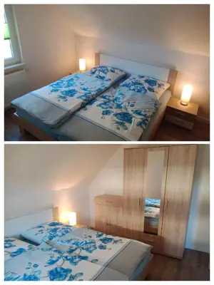 Ein Bett oder Betten in einem Zimmer der Unterkunft Ferienwohnung Rothen-Adler