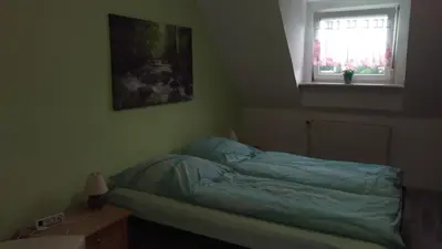 Ein Bett oder Betten in einem Zimmer der Unterkunft Ferienwohnung Fusi