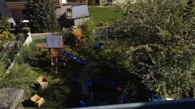 Ein Garten an der Unterkunft Ferienwohnung Fusi