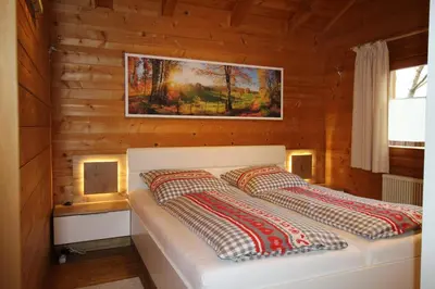 Ein Bett oder Betten in einem Zimmer der Unterkunft Romantikhütten 1 & 24