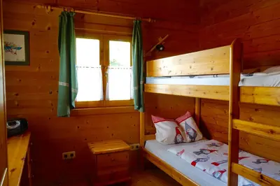 Ein Bett oder Betten in einem Zimmer der Unterkunft Romantikhütten 1 & 24