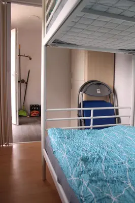 Ein Bett oder Betten in einem Zimmer der Unterkunft ZumSeehörnchen Haus Schmetterling