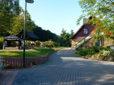 Ein Garten an der Unterkunft Ferienwohnungen Weißflog