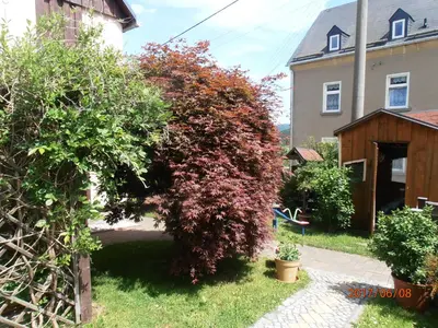 Ein Garten an der Unterkunft Ferienwohnung Baumann