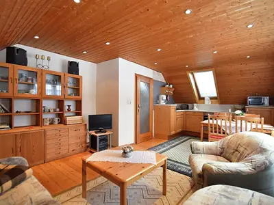Ein Sitzbereich in der Unterkunft Einladende Ferienwohnung mit Außenpool