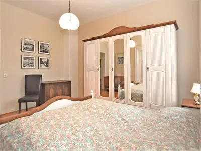 Ein Bett oder Betten in einem Zimmer der Unterkunft Exklusives Gruppenhaus mit home cinema