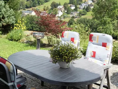 Ein Garten an der Unterkunft Cozy Ski Base with Garden