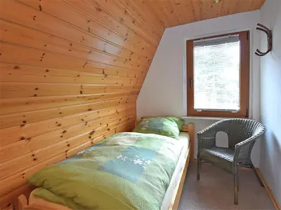 Ein Bett oder Betten in einem Zimmer der Unterkunft Mountain Hideaway in Wildenthal
