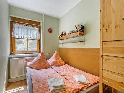 Ein Bett oder Betten in einem Zimmer der Unterkunft Forest Retreat in Jägersgrün