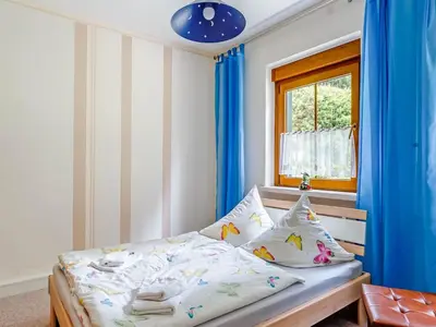 Ein Bett oder Betten in einem Zimmer der Unterkunft Forest Retreat in Jägersgrün