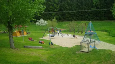 Ein Kinderspielbereich in der Unterkunft Blockhaus Hedwig Haus 10