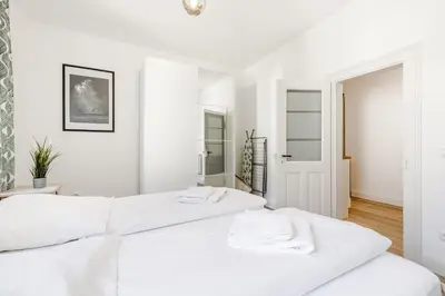 Ein Bett oder Betten in einem Zimmer der Unterkunft Old Town Center Apartments