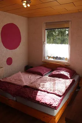 Ein Bett oder Betten in einem Zimmer der Unterkunft Zum-Seehörnchen Haus Fuchs