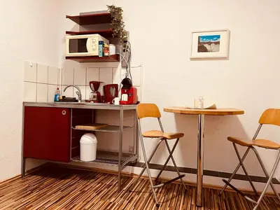 Küche/Küchenzeile in der Unterkunft Gasthof Hotel Bräustübl und Haus Boutique