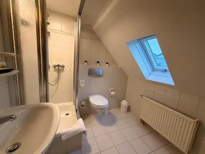 Ein Badezimmer in der Unterkunft Gasthof Hotel Bräustübl und Haus Boutique