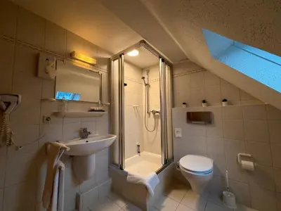 Ein Badezimmer in der Unterkunft Gasthof Hotel Bräustübl und Haus Boutique
