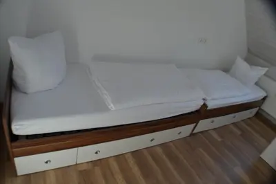 Ein Bett oder Betten in einem Zimmer der Unterkunft Ferienwohnung im Alten Zollhaus