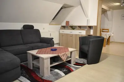 Ein Sitzbereich in der Unterkunft Ferienwohnung im Alten Zollhaus