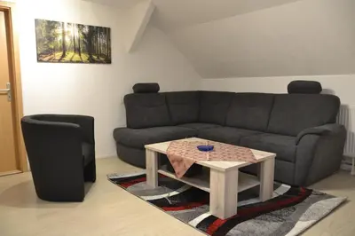 Ein Sitzbereich in der Unterkunft Ferienwohnung im Alten Zollhaus