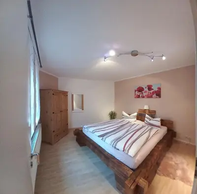 Ein Bett oder Betten in einem Zimmer der Unterkunft Ferienwohnung Döhlerwald