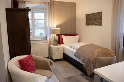 Ein Bett oder Betten in einem Zimmer der Unterkunft Drahthammer Schlößl