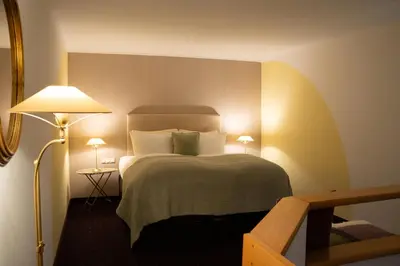 Ein Bett oder Betten in einem Zimmer der Unterkunft Drahthammer Schlößl