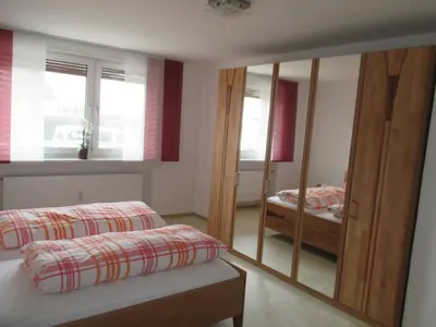 Ein Bett oder Betten in einem Zimmer der Unterkunft Stadtwohnung