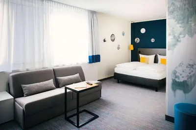 Ein Bett oder Betten in einem Zimmer der Unterkunft Vienna House Easy by Wyndham Amberg