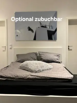 Ein Bett oder Betten in einem Zimmer der Unterkunft Exklusive Ferienwohnung im Zentrum von Plauen