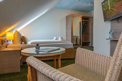 Ein Sitzbereich in der Unterkunft Der Bayerische Hof